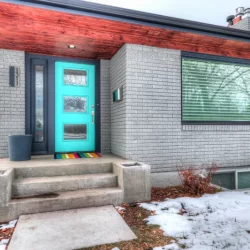 exterior home shot with turquoise blue door