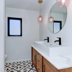 double sink vanity with circular mirror