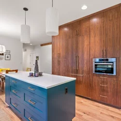 floor to ceiling cabinets and blue island