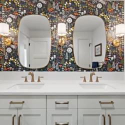 mosaic tile behind double sink and mirror vanity