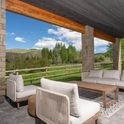 outdoor patio overlooking the trees and hills gallery image